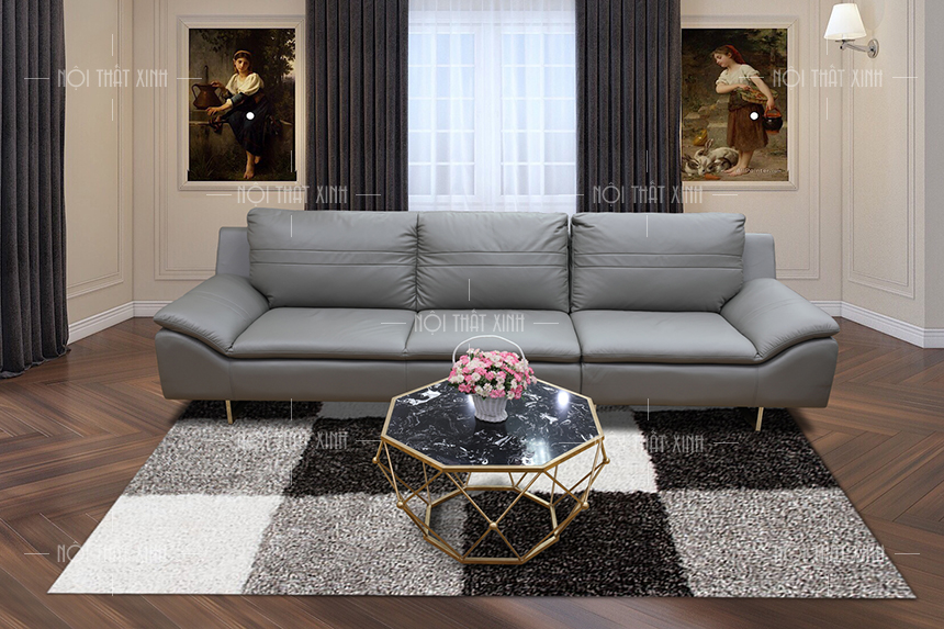 Sofa da phòng khách tân cổ điển trong hình sẽ mang đến cho không gian của bạn một vẻ đẹp đầy cổ điển và sang trọng. Chất liệu da cao cấp được chọn lọc kết hợp với thiết kế tinh tế trên từng đường nét, chiếc sofa này sẽ làm cho bạn cảm thấy như đang sống trong một chuyến du lịch ngược thời gian đến những năm
